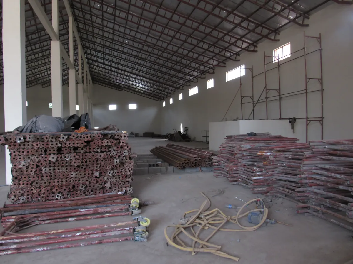 Pipes and steel reinforcement bars stacked in the store – Tibleino General Trading