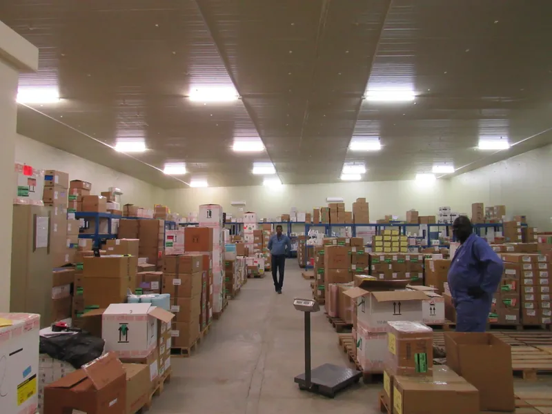 Stocked store aisles with boxed goods – Tibleino General Trading