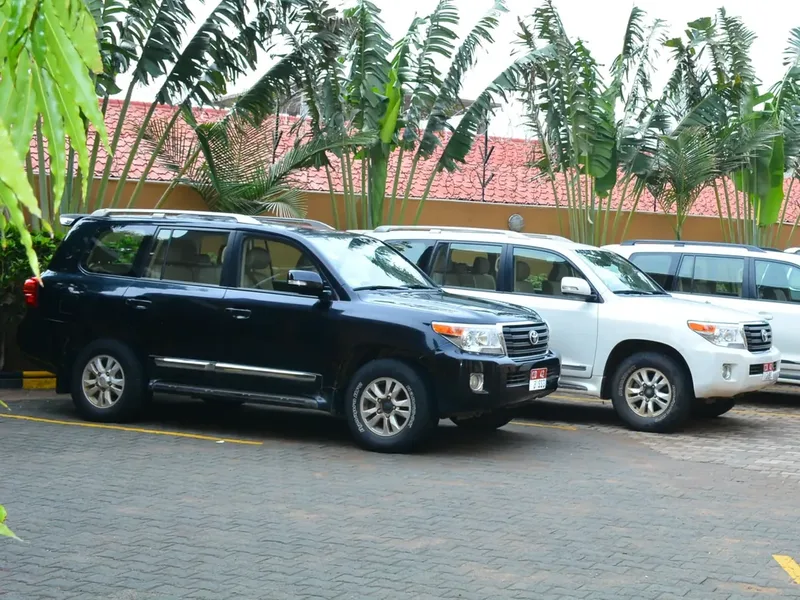 Tibleino Land Cruiser fleet parked in the yard, Juba